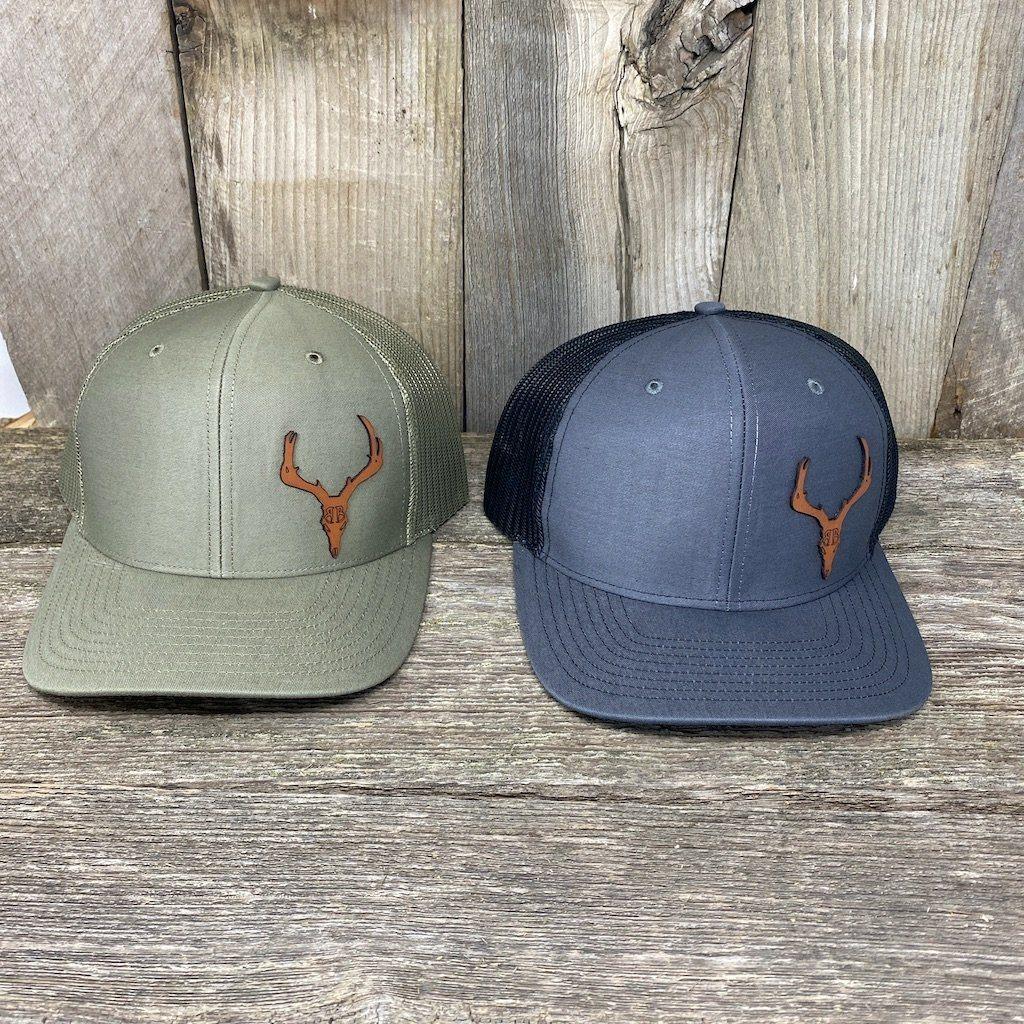 https://www.hellscanyondesigns.com/cdn/shop/products/custom-leather-patch-hats-leather-patch-hats-hells-canyon-designs-673118_1200x.jpg?v=1620067220